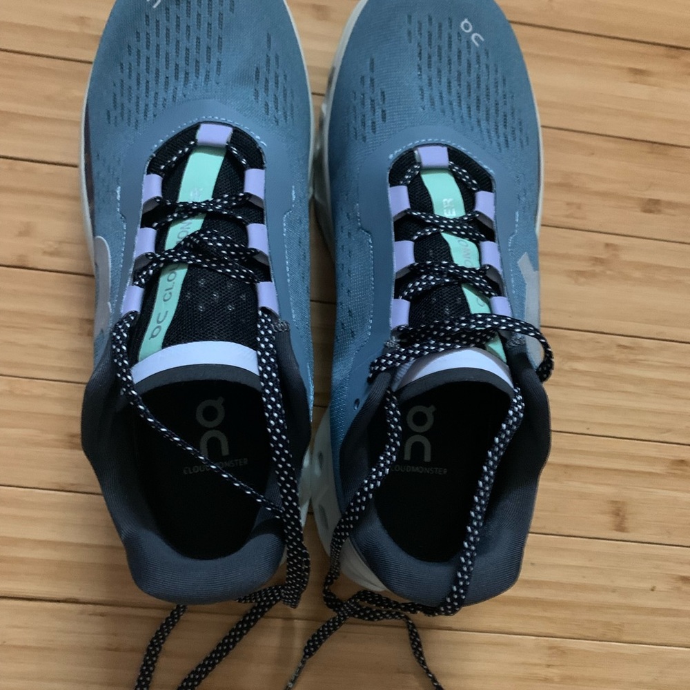 On Cloudmonster Athletic Shoes - Black and Blue